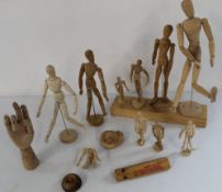 Selection of wooden articulated artists mannequins various sizes from 16cm - 47cm, an articulated