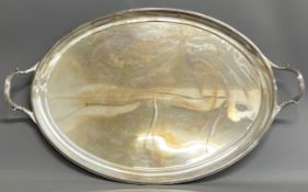 Large Edward VII silver oval two handled tray 110ozt. Made by Garrard & Co. London 1904. 72cm by