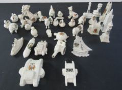 Collection of crested china including animals, buildings, tanks, artillery etc