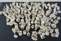 Large collection of crested china including clocks, pots, candle holders, teapots etc