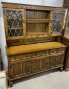 Dark oak display sideboard with linen fold panels W 150cm D 48cm Ht 176cm