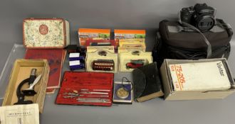 2 stamp albums, student microscope, Lumix digital camera & a Vivitar lens, diecast cars etc
