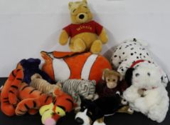 Ten large cuddly toys by Disney and others