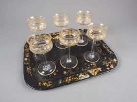 A 19th century papier mache card tray, base stamped "Jennens & Bettridge London, border decorated