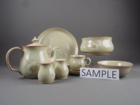 A Denby "Daybreak" combination service including meat dishes, casseroles, serving plates, etc