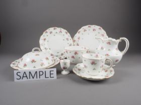 An early 20th century Crown Derby "Ditsy Roses" pattern part breakfast set for twelve with hand-