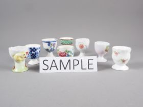 A collection of  approximately 120 egg cups, various