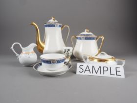 A Limoges part tea set with blue bordered scrolled decoration and other Continental china