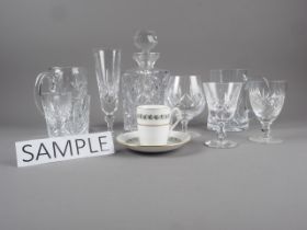 A pair of cut glass pint glasses, a part table service including six champagne flutes, a whisky