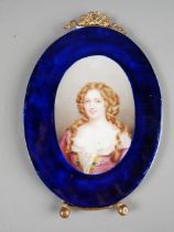 A 19th century porcelain portrait panel of Mme Montespan with gilt metal mounts, 8" high