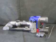 A Dyson hand held hoover. Disclaimer: electrical items are sold as untested and without guarantee.