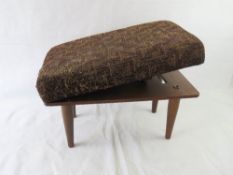 A vintage gout stool.