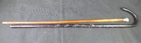 A Chinese carved wooden walking cane, dragon design,