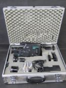 A Canon 8mm Video Camcorder with accessories in flight case.