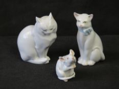 Three Herend porcelain figures being two cats and a mouse.