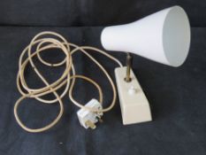 A vintage anglepoise wall lamp.