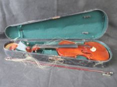 A vintage violin with bow, a/f, label within 'The Maidstone John G. Murdoch & Co., Ltd.