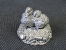 A Country Artist hallmarked silver ducks figure.