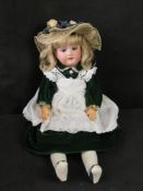 An Armand Marseilles bisque head doll, A.2 1/2 .