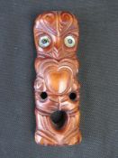 A New Zealand 'Teko Teko' Maori wood carving by Moana Wood Carvings.