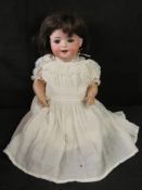 An Ernst Heubach bisque head 300-3 doll