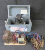 An Astro compass in box together with unknown item.