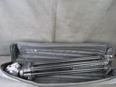 A vinten Pro 5 plus camera tripod in bag.