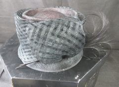 A hat for special occasions weddings / ascot etc in associated box.