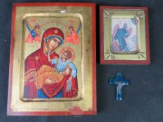 Religious Iconography; two carved and painted wooden icons and a glass crucifix.