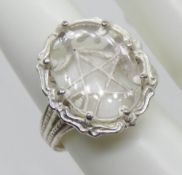 An 800 silver Wiccan pentagram ring with white stone.