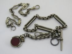 Two white metal Albert watch chains, one having agate fob upon.