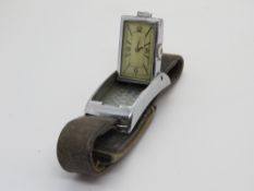 An early 20th century hidden dial wristwatch,