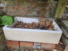 A butlers sink repurposed as a garden planter, 78 x 47cm.