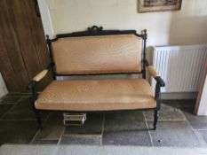 An antique French style salon couch, circa 1880, reupholstered in the traditional manner,
