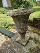 A urn shaped garden planter standing approx 50cm high.