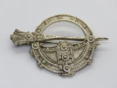 A silver Celtic cloak pin style brooch, hallmarked for Birmingham.