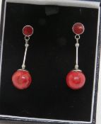 A pair of modern faux coral and silver earrings, stamped 925, with butterfly backs,