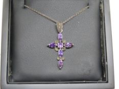 A Gothic silver crucifix set with purple stones and marcasites, 4.