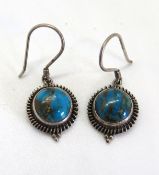 A pair of Native American style silver and turquoise earrings, stamped 925.