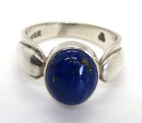 A silver and Lapis Lazuli ring, makers mark upon, stamped silver.
