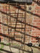 A square shaped frame for plants.