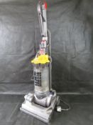 A Dyson upright hoover. Disclaimer: electrical items are sold as untested and without guarantee.