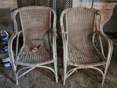 A pair of wicker chairs, a/f.