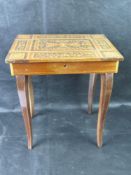 A vintage Italian inlaid music box table, Swiss movement.