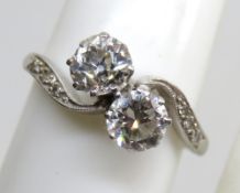 A beautiful two stone diamond ring in classic twist setting,