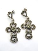 A large pair of silver and marcasite cross shaped earrings, stamped 925.