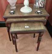 A contemporary nest of three reproduction leather topped tables, 59cm, 48cm,