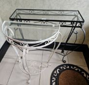 A contemporary wrought iron and glass side table, 70cm high. Together with another similar.