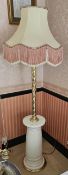 A c1980s ceramic and brass standard lamp with shade, 175cm high.