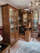 A superb polished and half veneered walnut corner bar, raised central serving area having shelved